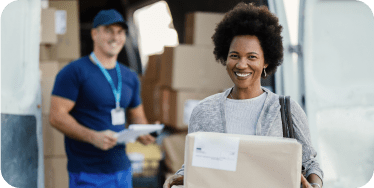 Happy African Woman Holding Delivered Packages